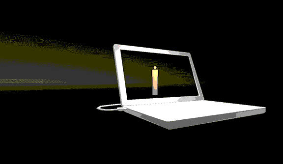 A 360 pan of a laptop with the screen showing a candle
